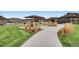 Community pavilion with picnic tables and seating, set in a well-maintained green space at 1896 Hogan Ct, Castle Rock, CO 80109