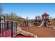 Community playground with slides and climbing structures, offering a safe and fun play area for children at 1896 Hogan Ct, Castle Rock, CO 80109