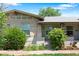 Charming bungalow with brick and stucco exterior, featuring a well-maintained front yard and cozy entrance at 1211 E 26Th Ave, Denver, CO 80205
