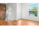Well-lit living room with hardwood floors, offering a modern design with ample natural light at 1211 E 26Th Ave, Denver, CO 80205
