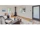 Cozy living room features hardwood floors, a fireplace, and natural light at 1557 North St, Boulder, CO 80304