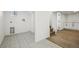 Spacious basement featuring laundry hookups, tile flooring, and access to upper level at 1209 Harrison St, Denver, CO 80206