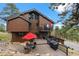 Beautiful home featuring a spacious deck for outdoor living and entertaining at 7282 Silverhorn Dr, Evergreen, CO 80439