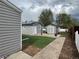 Backyard shed features solar panel, grassy area and walkway at 98 N 12Th Ave, Brighton, CO 80601