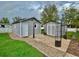 Cozy backyard shed offers additional storage space with mature landscaping and convenient access at 98 N 12Th Ave, Brighton, CO 80601