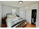 Comfortable bedroom offers natural light, closet, bedside tables, and relaxing space at 98 N 12Th Ave, Brighton, CO 80601