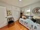 Cozy bedroom with natural light, stylish decor, and comfortable furniture for a relaxing and inviting space at 98 N 12Th Ave, Brighton, CO 80601