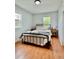 This bedroom offers ample natural light, making it the perfect spot to unwind and relax after a long day at 98 N 12Th Ave, Brighton, CO 80601
