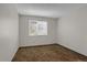 Bedroom featuring neutral walls and carpet with a window at 8441 Timberwood St, Littleton, CO 80126