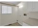 Laundry room with a window, closet and countertop at 8441 Timberwood St, Littleton, CO 80126