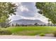 Expansive green space with views of mountains, providing a serene and picturesque environment for residents to enjoy at 6220 Salvia St, Arvada, CO 80403