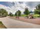 Well-maintained playground with swings, slides, and climbing structures, offering a fun and safe environment for children at 6220 Salvia St, Arvada, CO 80403