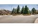 Neighborhood street view highlighting well-maintained landscaping and attractive homes in a Gathering-friendly community at 6220 Salvia St, Arvada, CO 80403