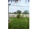 View of park with trees and grassy backyard at 3000 Billings St, Aurora, CO 80011
