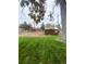 Backyard with a well maintained lawn and storage shed at 3000 Billings St, Aurora, CO 80011