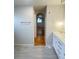 Bathroom with double vanity, modern fixtures, and views into bedroom at 3000 Billings St, Aurora, CO 80011