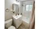 Updated bathroom with new vanity, tub, and shower at 3000 Billings St, Aurora, CO 80011