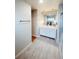 Bathroom with double sink vanity, modern fixtures, and walk-in shower at 3000 Billings St, Aurora, CO 80011