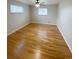 Spacious bedroom with natural light and hardwood floors at 3000 Billings St, Aurora, CO 80011