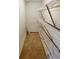 Walk in closet with built in wire shelving and tan carpeting at 3000 Billings St, Aurora, CO 80011