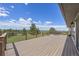 Expansive deck boasts scenic views, outdoor seating, and is perfect for entertaining guests at 30999 Kootney St, Elizabeth, CO 80107