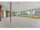 Large basement area with expansive windows, neutral carpet, and good natural light at 30999 Kootney St, Elizabeth, CO 80107