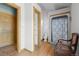Bathroom with a shower, toilet, and storage, featuring wood flooring and trim at 30999 Kootney St, Elizabeth, CO 80107