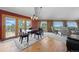 Open-concept living space featuring a dining area, a comfortable seating area, and scenic views at 30999 Kootney St, Elizabeth, CO 80107