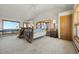 Bedroom with custom wood frame bed and exterior views at 30999 Kootney St, Elizabeth, CO 80107
