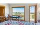 Bedroom with a blue massage table, an exterior view and natural lighting at 30999 Kootney St, Elizabeth, CO 80107