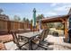 Backyard dining and patio area with pergola, ideal for outdoor gatherings at 6445 Second St, Louviers, CO 80131