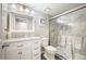Bathroom featuring a shower, marble vanity top and modern lighting at 23612 Pondview Pl # A, Golden, CO 80401