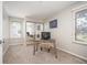 Bedroom featuring neutral paint, carpeted floors, mirrored closet and natural light at 23612 Pondview Pl # A, Golden, CO 80401