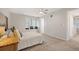 Inviting bedroom features a window seat, carpeted floors and neutral wall colors at 23612 Pondview Pl # A, Golden, CO 80401