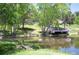 Scenic view of the pond with a small pier at 23612 Pondview Pl # A, Golden, CO 80401