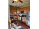 Cozy kitchen with stainless steel appliances, wood cabinets, and a charming breakfast nook at 2941 Castle Butte Drive Dr, Castle Rock, CO 80109