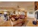 Open-concept living room showcasing hardwood floors, ample seating, and seamless flow to other living spaces at 2941 Castle Butte Drive Dr, Castle Rock, CO 80109