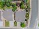 Aerial view of a single Gathering home featuring mature landscaping and a backyard fire pit at 2908 Open Sky Way, Castle Rock, CO 80109
