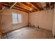 Unfinished basement featuring a window and insulated walls at 2908 Open Sky Way, Castle Rock, CO 80109