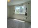 Bedroom with large window providing views of the manicured backyard at 2908 Open Sky Way, Castle Rock, CO 80109