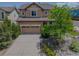 Charming two-story home with a well-maintained yard and inviting curb appeal at 2908 Open Sky Way, Castle Rock, CO 80109