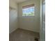 A walk-in closet with wire shelving and a sunlit window at 2908 Open Sky Way, Castle Rock, CO 80109
