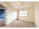 Bright bedroom with neutral walls and carpet flooring at 911 Snowberry St, Longmont, CO 80503