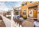 Cute yellow townhome with a fenced patio, perfect for relaxing at 911 Snowberry St, Longmont, CO 80503