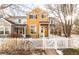 Attractive two-story townhome with a white picket fence at 911 Snowberry St, Longmont, CO 80503