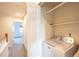 Laundry room with washer, dryer, and shelving at 911 Snowberry St, Longmont, CO 80503