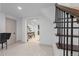 Basement hallway with patterned flooring and staircase at 2068 Jasmine St, Denver, CO 80207
