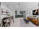 Finished basement with living area and kitchenette at 2068 Jasmine St, Denver, CO 80207