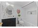 Basement bathroom with white subway tile and bathtub at 2068 Jasmine St, Denver, CO 80207