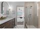 Spa-like bathroom with walk-in shower and bedroom view at 2068 Jasmine St, Denver, CO 80207